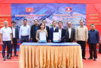 Vietnam, Laos step up cooperation in education, human resources development